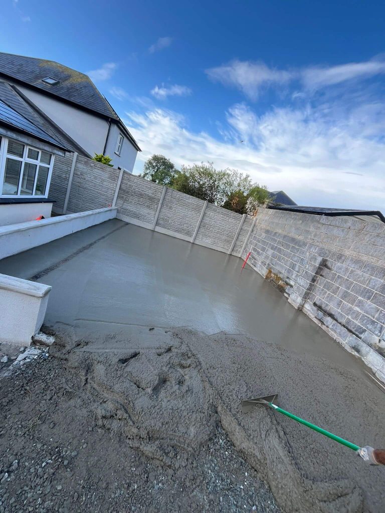 laying a new concrete patio