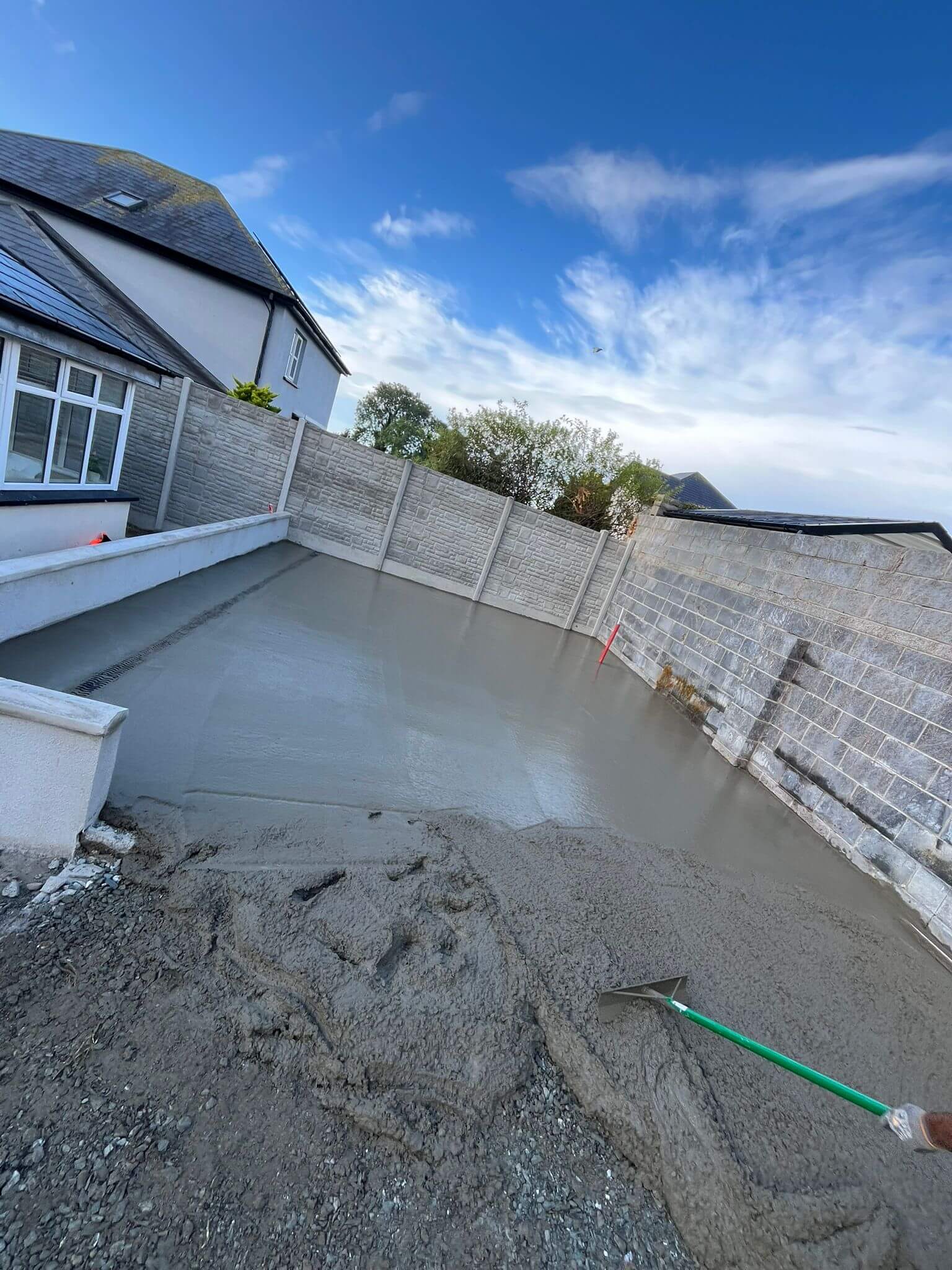 laying a new concrete patio